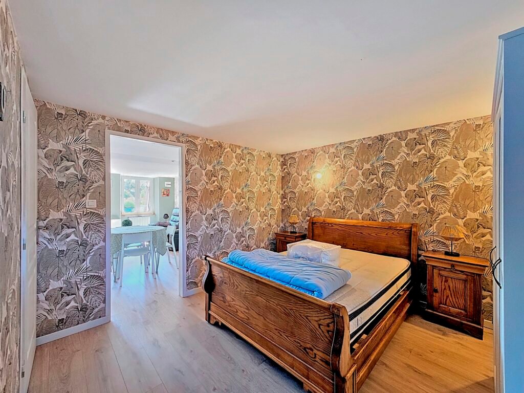 Chambre confortable de l’appartement L’Olivier à Évaux-les-Bains