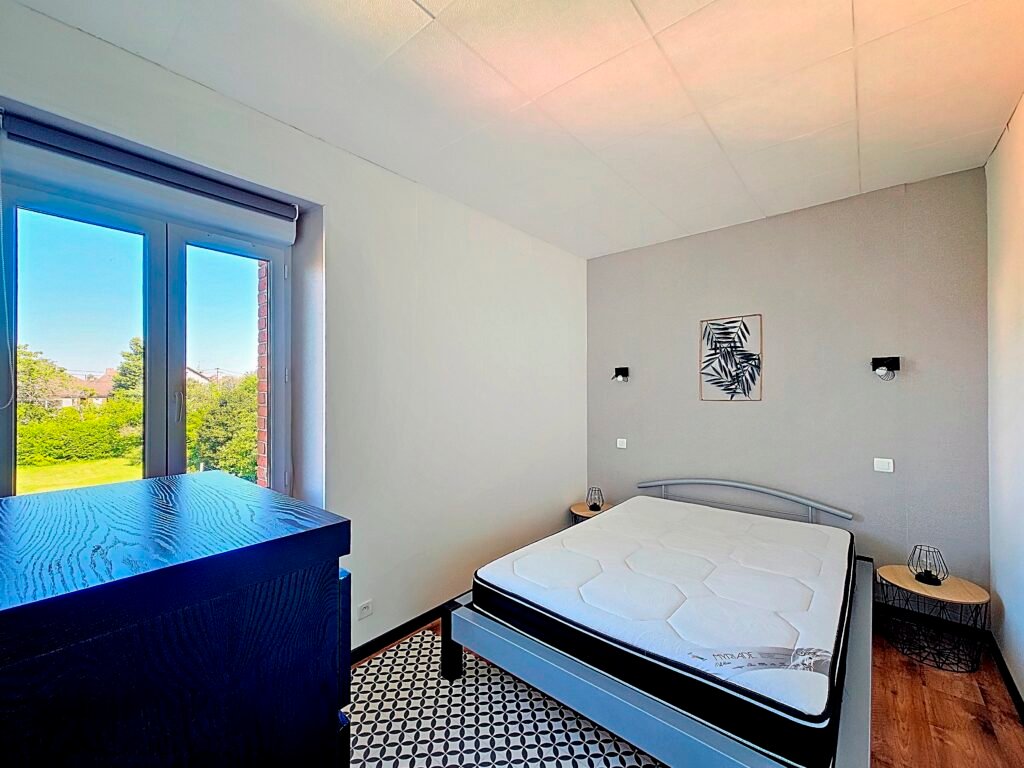 Chambre de l’appartement Le Tilleul à Évaux-les-Bains